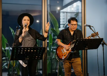 Two singers perform live at Dao AMTD Singapore