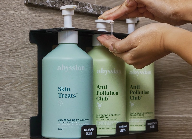 abyssian products on the shelf in the Studio Deluxe King Room bathroom.