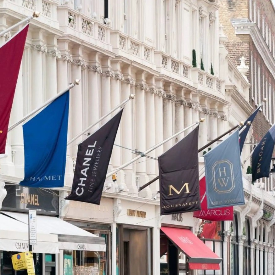 An array of flags hung on the buildings in Bond Street London.